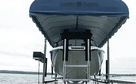 Boat on lift at Summit Marine marina.
